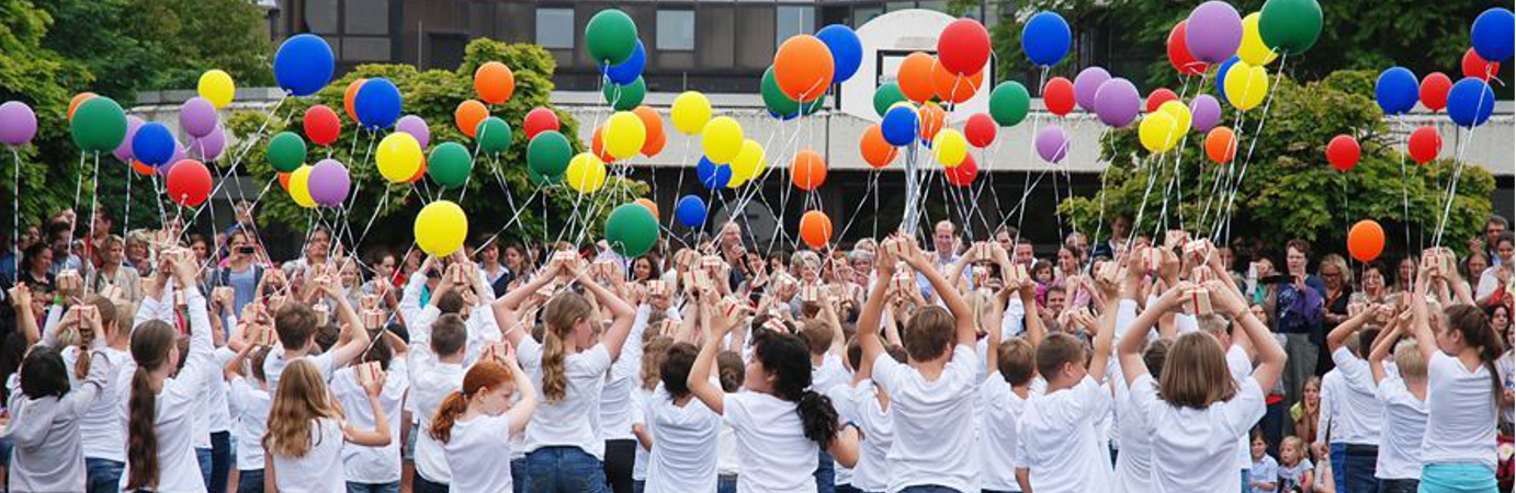 Banner Luftballons Grunschule (c) Bischöfliche Maria-Montessori-Grundschule