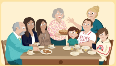 Familie aus mehreren Generationen versammelt um den Küchentisch